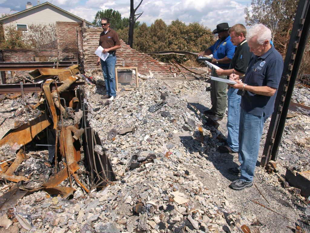 experts assessing the damage