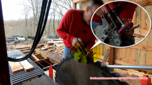 Close-up of a sawmill blade being inspected for wear and damage