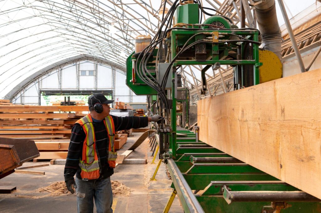 Sawmill operator following safety practices on the job